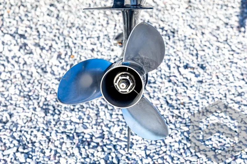 Slide: The Image of Close-up of a boat propeller on gravel, 2002 Ranger 185 VS. - 17