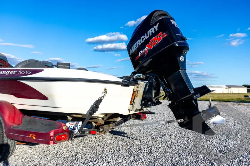 Slide: The Image of 2002 Ranger 185 VS boat with Mercury Pro XS engine on gravel. - 18
