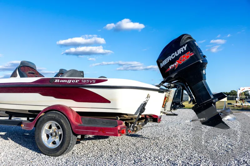 Slide: The Image of 2002 Ranger 185 VS boat with Mercury Pro XS engine on gravel lot. - 20