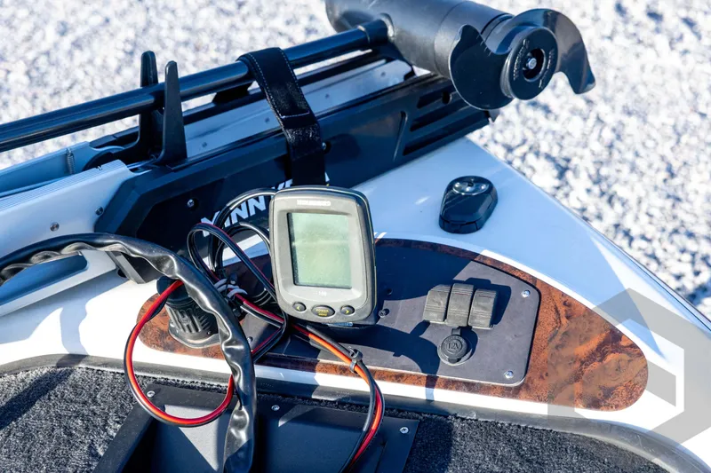 Slide: The Image of 2002 Ranger 185 VS boat dashboard with fish finder and control panel. - 33