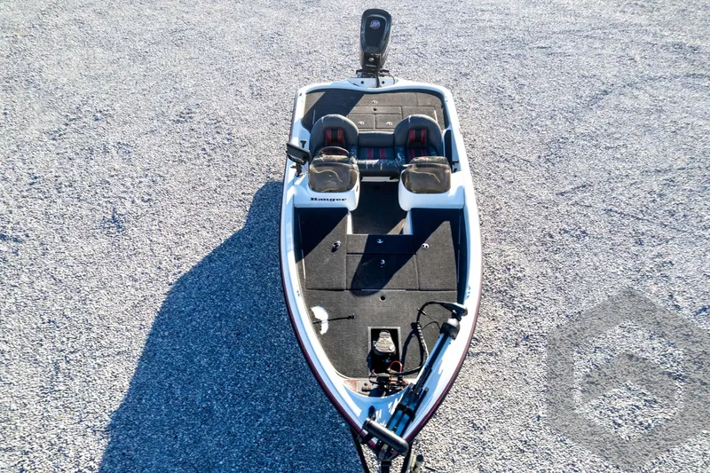 Slide: The Image of 2002 Ranger 185 VS boat on gravel surface, top view. - 65