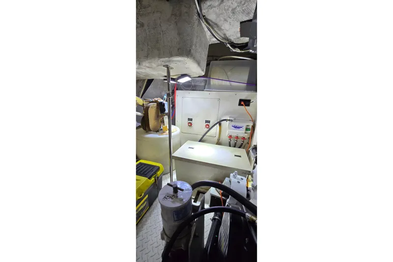 Slide: The Image of Interior view of 2006 Cruisers Yachts 520 Express, featuring spacious seating and helm area. - 30