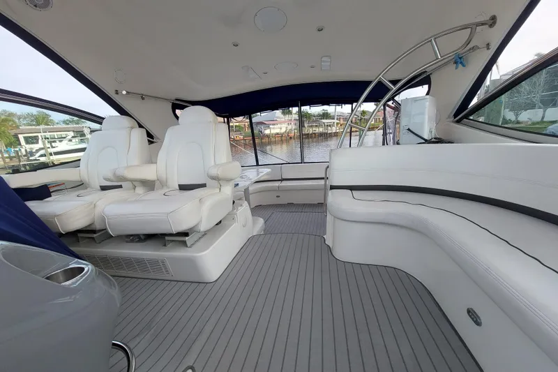 Slide: The Image of 2006 Cruisers Yachts 520 Express hull detail with trim tabs and fittings. - 40