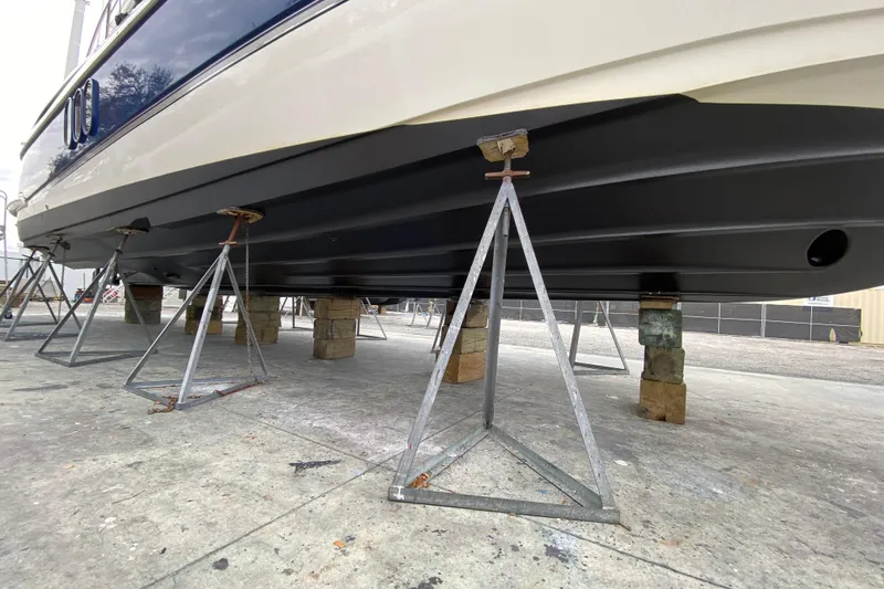 Slide: The Image of Luxurious interior of 2006 Cruisers Yachts 520 Express with elegant seating and modern kitchen. - 51