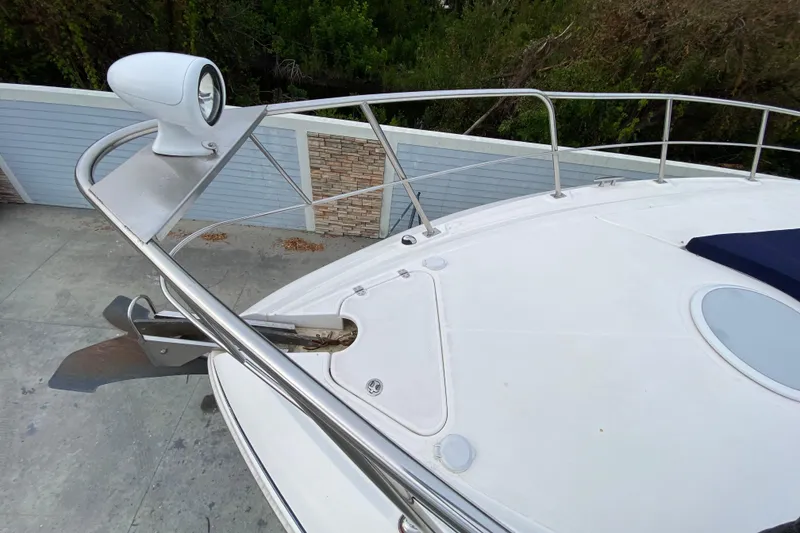 Slide: The Image of Luxurious 2006 Cruisers Yachts 520 Express interior with plush seating and elegant wood finishes. - 55