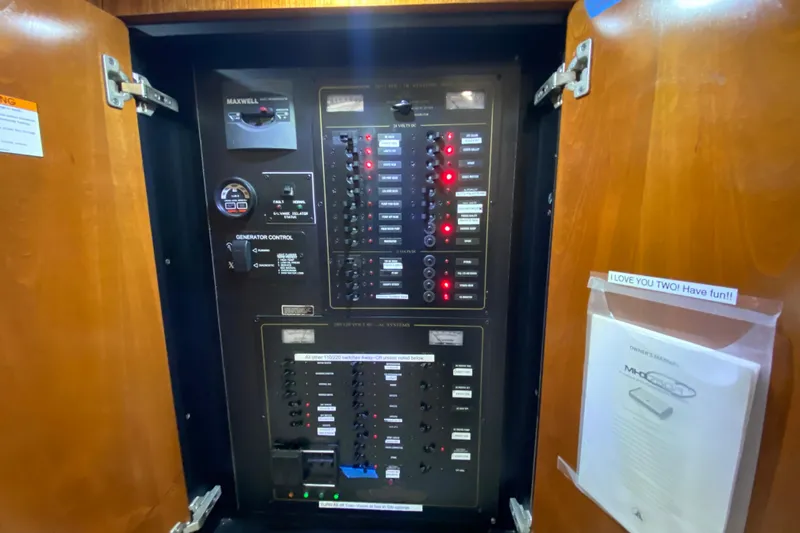 Slide: The Image of Luxurious bathroom in 2006 Cruisers Yachts 520 Express with modern fixtures and wood accents. - 75