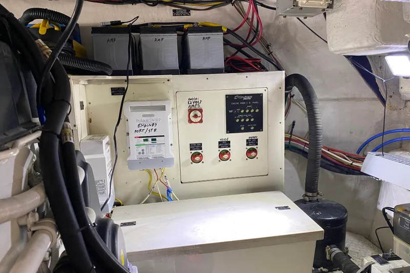 Slide: The Image of Engine room of 2006 Cruisers Yachts 520 Express with visible machinery and components. - 98