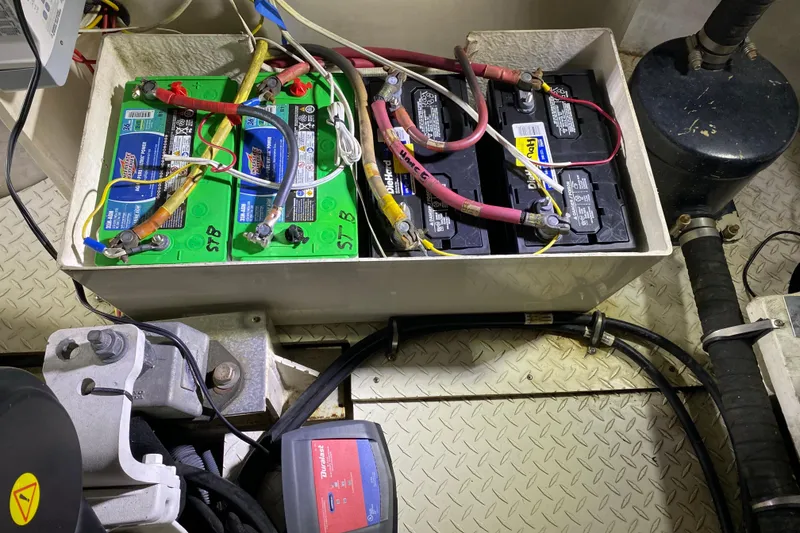 Slide: The Image of Engine room of 2006 Cruisers Yachts 520 Express with visible cables and components. - 99