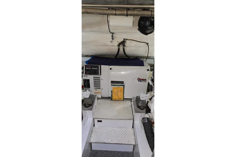 Slide: The Image of 2006 Cruisers Yachts 520 Express interior with white seating and panoramic windows. - 29