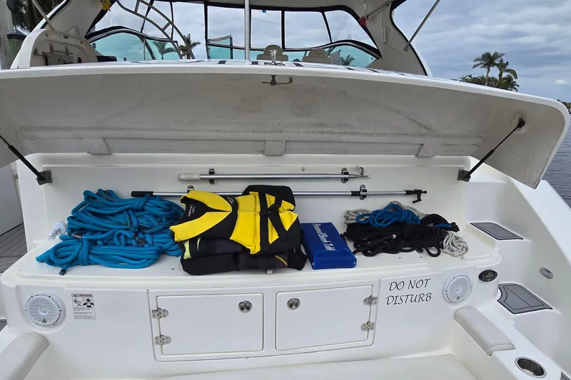 Slide: The Image of 2006 Cruisers Yachts 520 Express interior with seating, helm, and panoramic windows. - 47