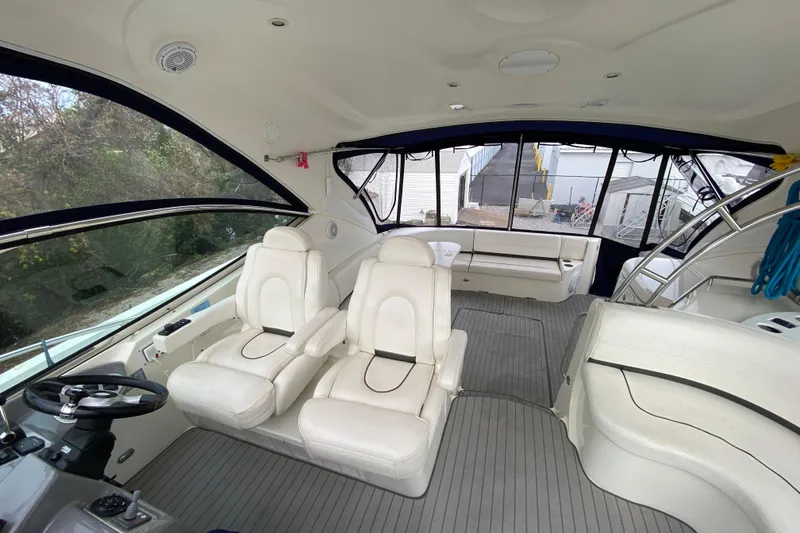 Slide: The Image of Luxurious 2006 Cruisers Yachts 520 Express kitchen with modern appliances and sleek countertops. - 59