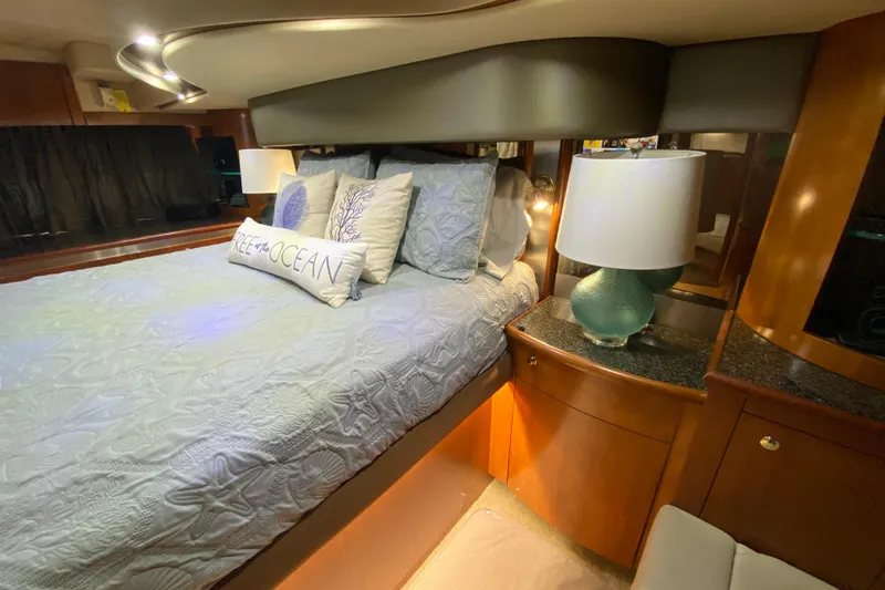 Slide: The Image of Luxurious bathroom in 2006 Cruisers Yachts 520 Express, featuring shower and vanity. - 80
