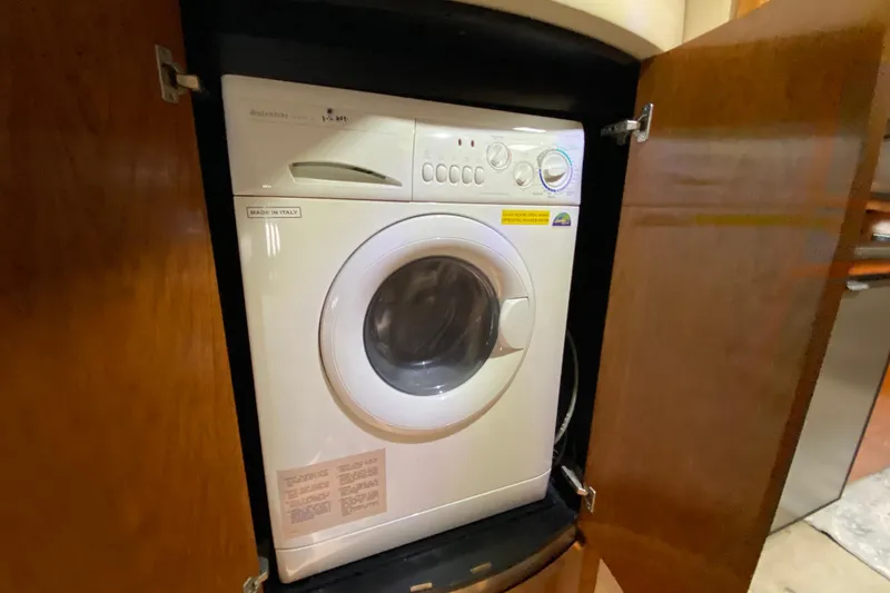 Slide: The Image of Luxurious bathroom in 2006 Cruisers Yachts 520 Express, featuring modern amenities and elegant design. - 83