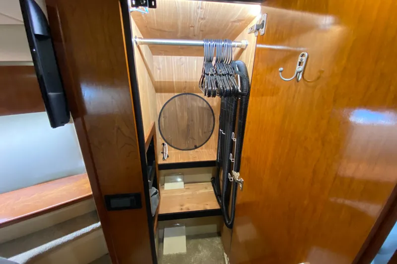 Slide: The Image of Engine room of 2006 Cruisers Yachts 520 Express with Volvo engines and equipment. - 85