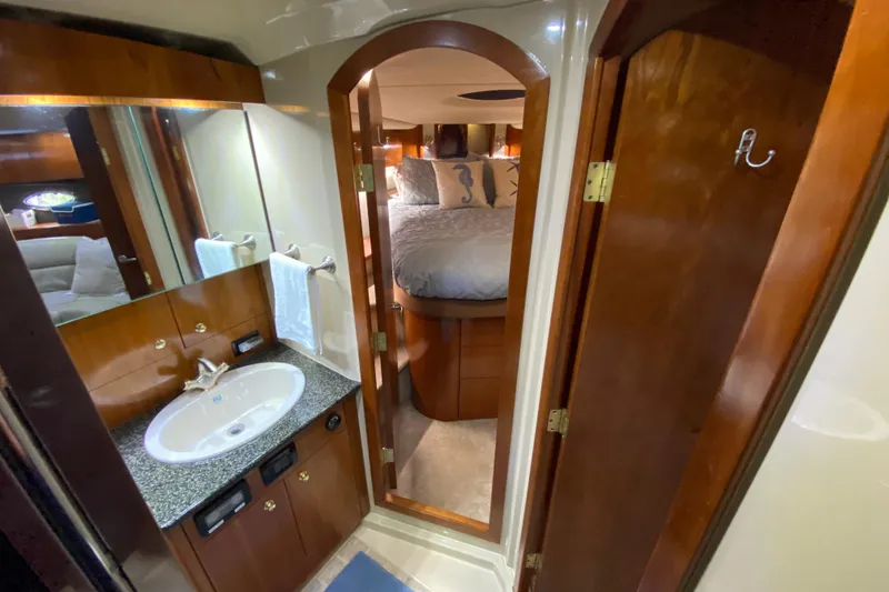 Slide: The Image of Engine room of 2006 Cruisers Yachts 520 Express with electrical panel and batteries. - 95