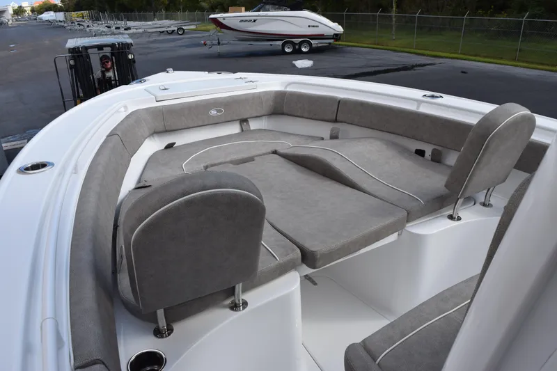 Slide: The Image of 2026 Sea Hunt Ultra 255 SE boat with spacious seating and modern design. - 12