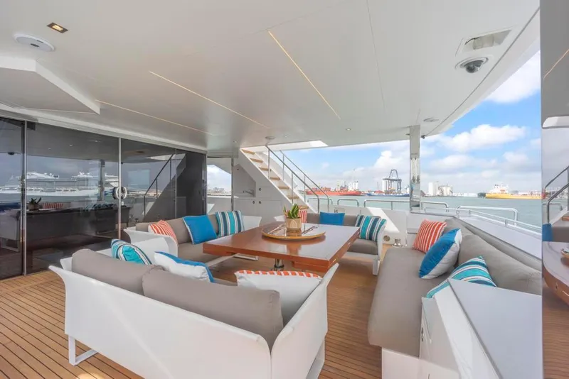 Slide: The Image of Aft Deck Sofas and Sliding Glass Doors to Salon - 13