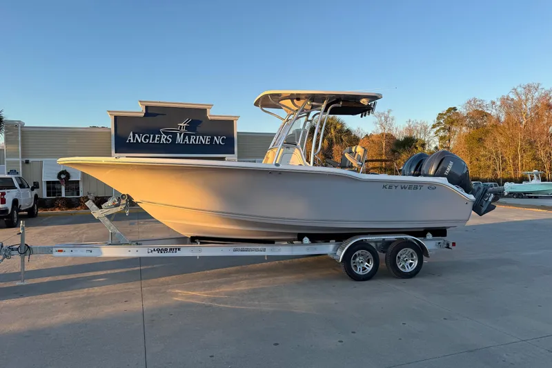 Slide: The Image of 2026 Key West 244 Center Console boat on trailer at Anglers Marine NC. - 2