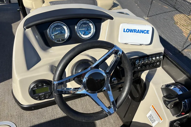 Slide: The Image of Steering console of 2022 Barletta Cabrio 22Q with Lowrance display and gauges. - 10