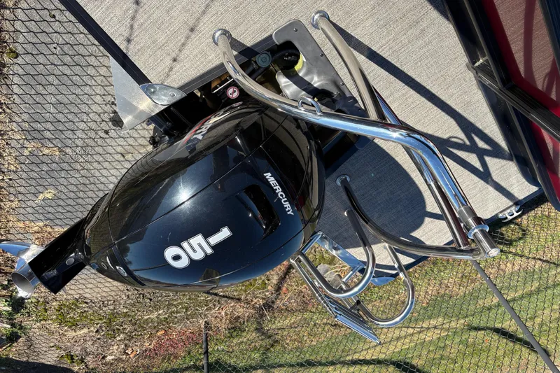 Slide: The Image of Overhead view of a 2022 Barletta Cabrio 22Q boat with Mercury outboard motor. - 12