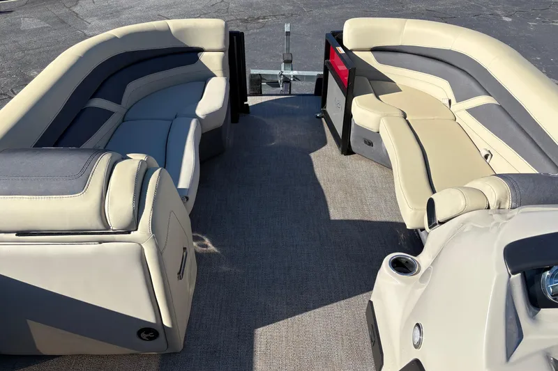 Slide: The Image of 2022 Barletta Cabrio 22Q pontoon boat interior with plush seating and modern design. - 6