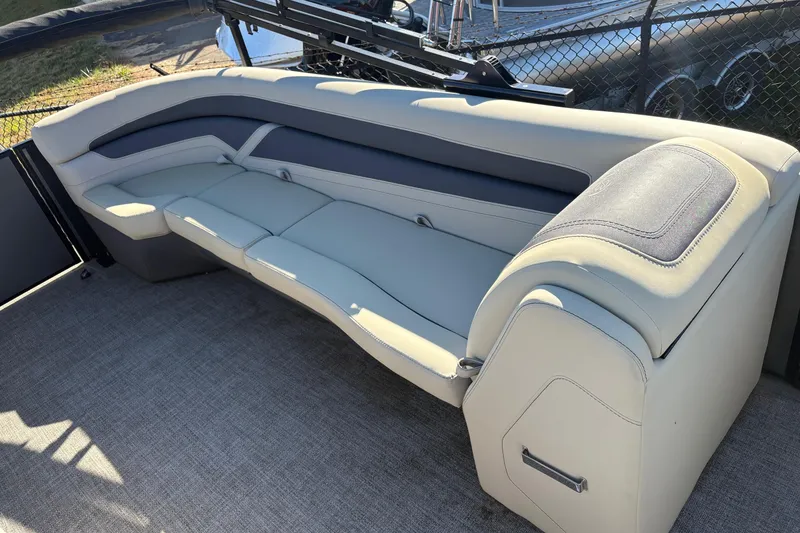 Slide: The Image of Luxurious seating on 2022 Barletta Cabrio 22Q pontoon boat, featuring sleek design and comfort. - 7