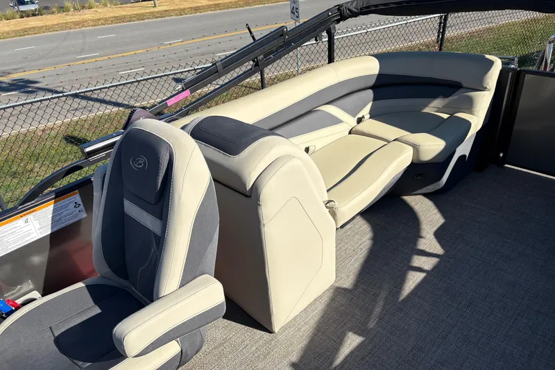 Slide: The Image of 2022 Barletta Cabrio 22Q boat interior with plush seating and modern design. - 8