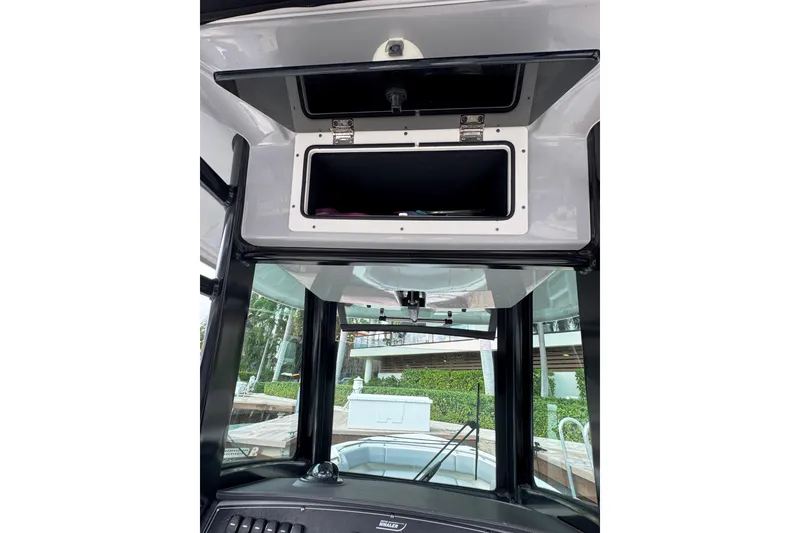 Slide: The Image of 2024 Boston Whaler 280 Outrage boat interior storage compartment. - 13