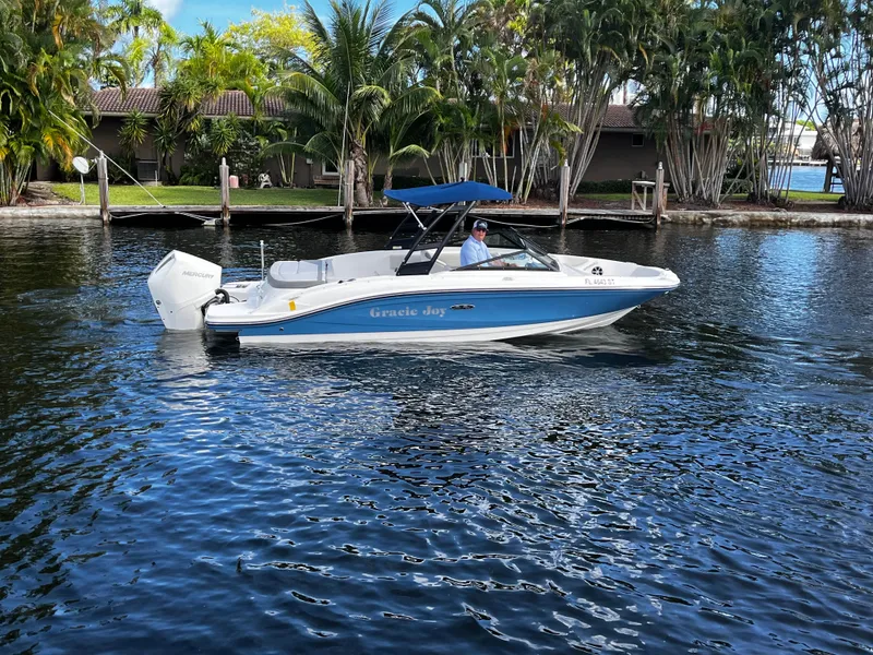 Slide: The Image of 2020 Sea Ray 21 SPX-OB boat on calm water. - 0