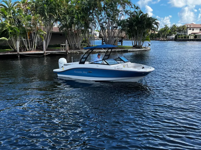 Slide: The Image of 2020 Sea Ray 21 SPX-OB boat on calm water. - 5