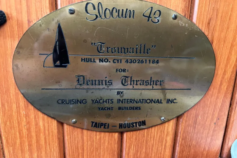 Slide: The Image of Plaque on Slocum 43 yacht, 1984, displaying hull number and builder details. - 2