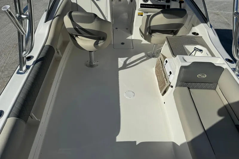 Slide: The Image of 2025 Key West 239 DFS boat interior with seating and console. - 7