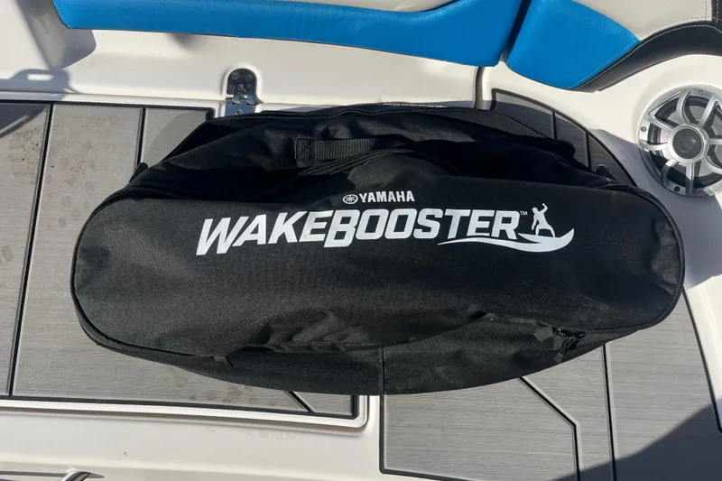Slide: The Image of Black Yamaha WakeBooster bag on 2019 Yamaha Boats 212X deck. - 3