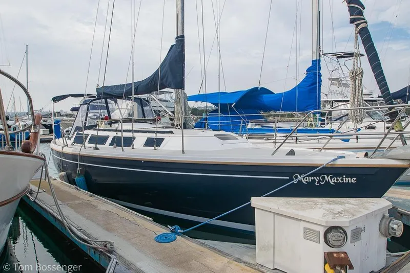 The Image of 1984 Catalina 36 sailboat docked at marina, named "Mary Maxine." - 1