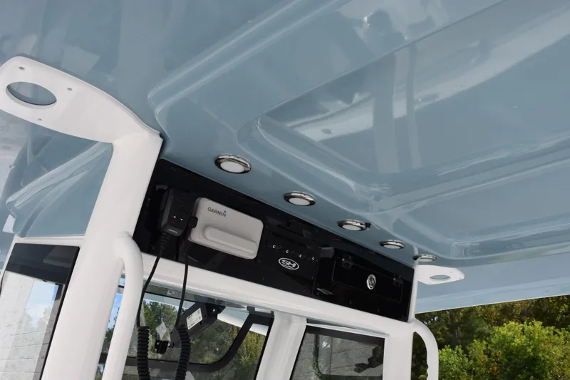 Slide: The Image of 2026 Sea Hunt Ultra 305 Coffin Box boat console with Garmin electronics and sleek design. - 11