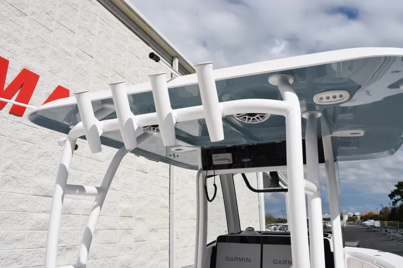 Slide: The Image of 2026 Sea Hunt Ultra 305 Coffin Box boat with rod holders and Garmin electronics. - 9