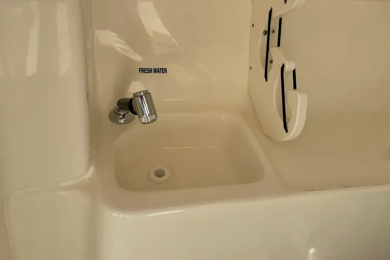 Slide: The Image of 2025 Key West 239 DFS boat sink with fresh water faucet. - 14