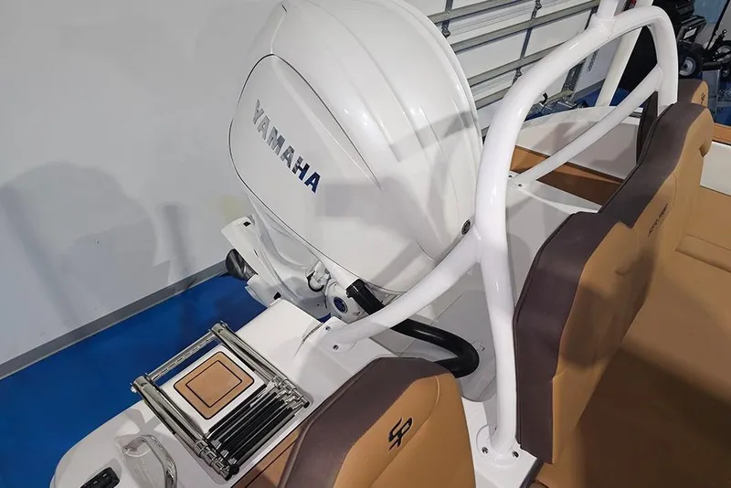Slide: The Image of 2026 Sea Pro 245FLX Sandbar boat with Yamaha outboard motor and foldable ladder. - 10
