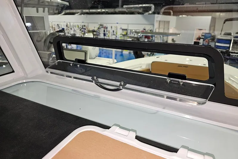 Slide: The Image of 2026 Sea Pro 245FLX Sandbar boat interior with window view. - 22