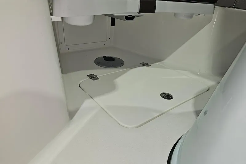 Slide: The Image of Interior view of 2026 Sea Pro 245FLX Sandbar boat, featuring storage compartment. - 30