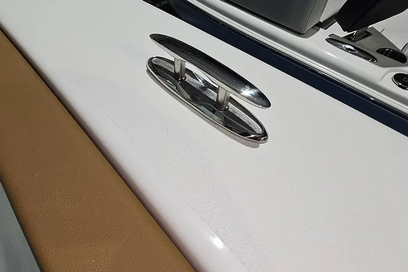 Slide: The Image of 2026 Sea Pro 245FLX Sandbar boat cleat on white and tan surface. - 33