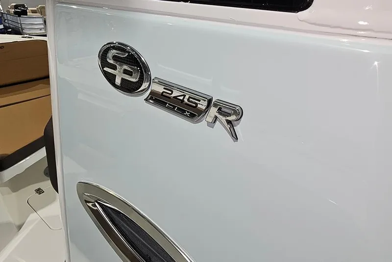 Slide: The Image of 2026 Sea Pro 245FLX Sandbar boat emblem and model badge detail. - 34