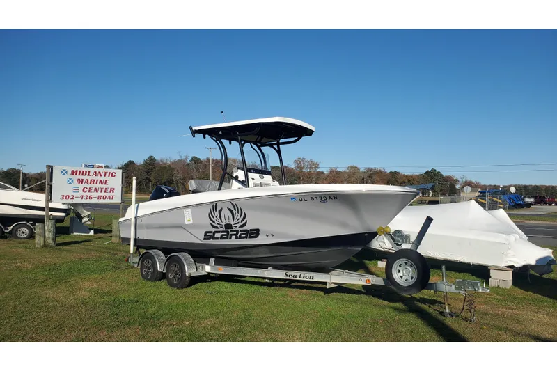 The Image of 2021 Wellcraft 222 Scarab Offshore boat on trailer at Midlantic Marine Center. - 1