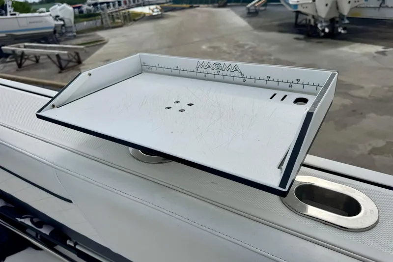 Slide: The Image of Cutting board on 2023 Blackfin 332 CC boat, featuring Magma ruler. - 107