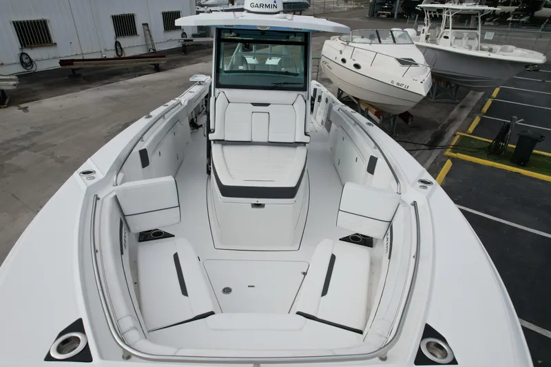 Slide: The Image of 2023 Blackfin 332 CC boat with spacious seating and modern design. - 35