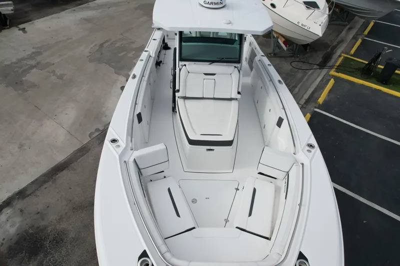 Slide: The Image of 2023 Blackfin 332 CC boat interior with spacious seating and modern design. - 48