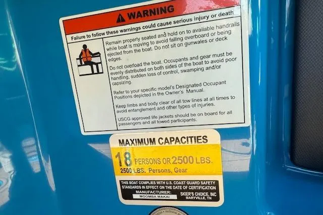 Slide: The Image of Warning label on 2020 Moomba Makai boat, indicating maximum capacity of 18 persons or 2500 lbs. - 10