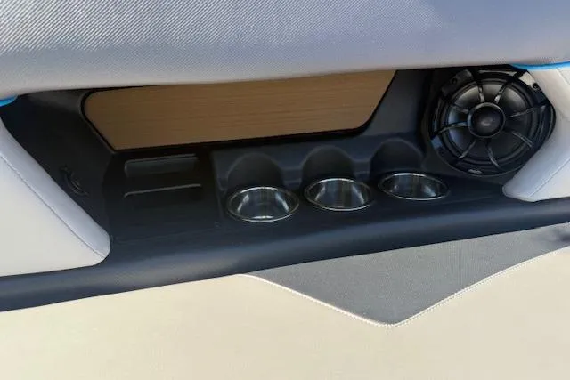 Slide: The Image of 2020 Moomba Makai interior with cup holders and speaker detail. - 31