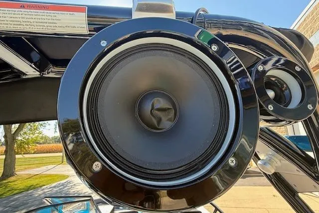 Slide: The Image of Close-up of a 2020 Moomba Makai boat speaker system in a sunny outdoor setting. - 33