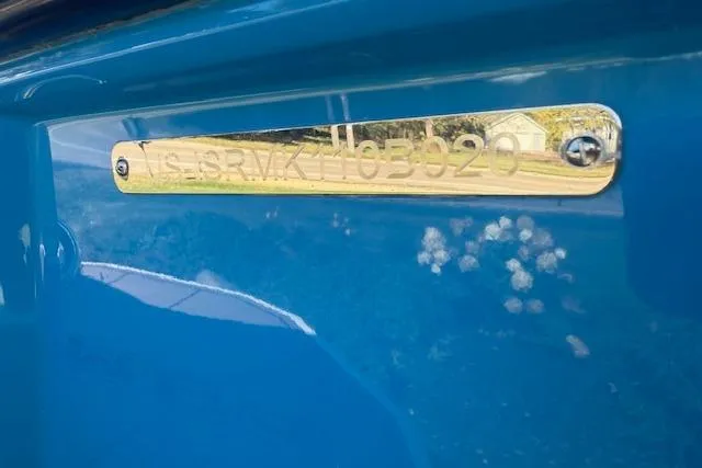 Slide: The Image of 2020 Moomba Makai boat with visible identification plate on blue hull. - 47